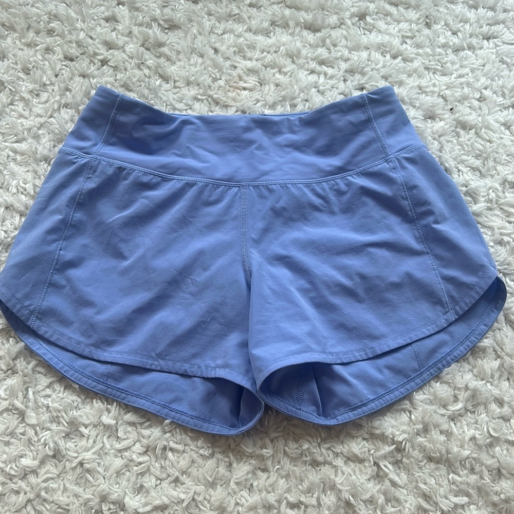 Light purple size 6 speed up low rise lined lululemon shorts.